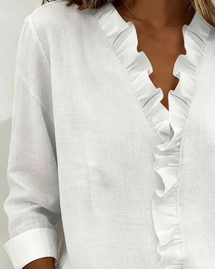 Clara™ | Blusa con cuello en V y volantes delicados